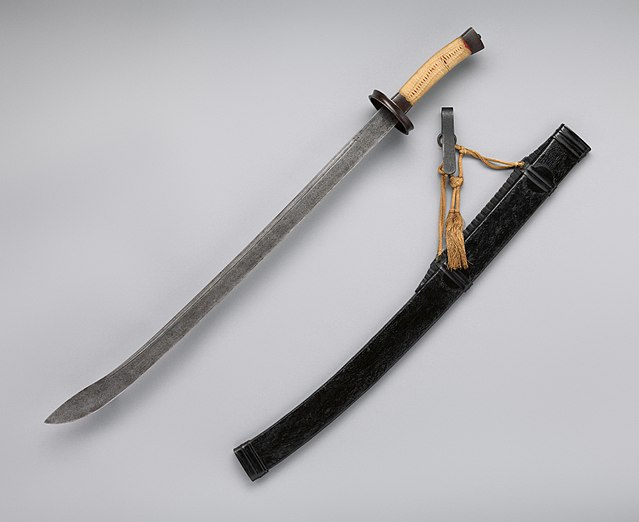 Chinese Dao sword displayed with its scabbard, featuring a single-edged, curved blade and traditional handle, exemplifying classic Chinese weaponry design