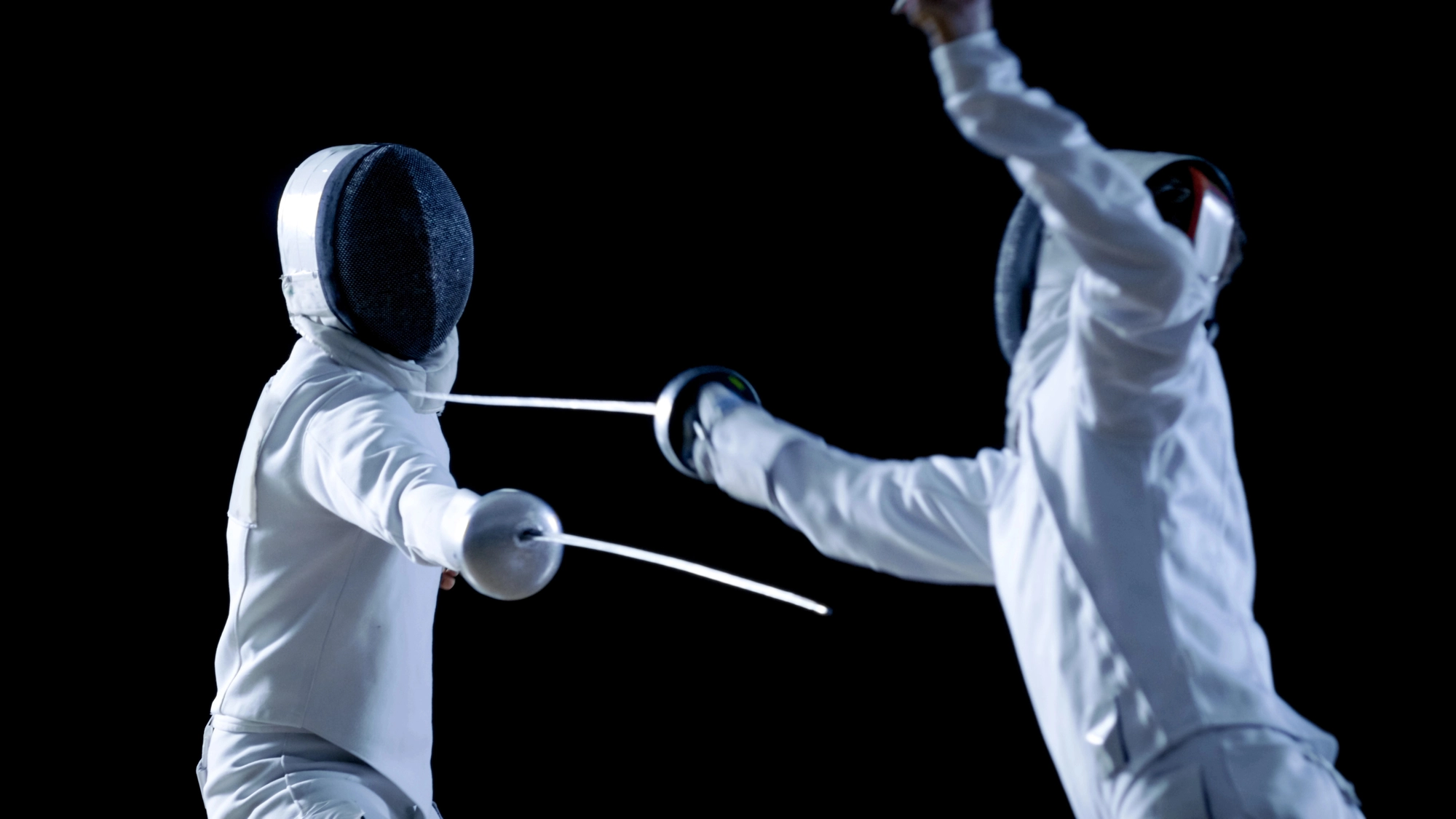Foil Fencers in a duel.