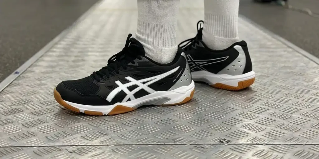 Asics gel rocket 11 shoe on a fencing strip