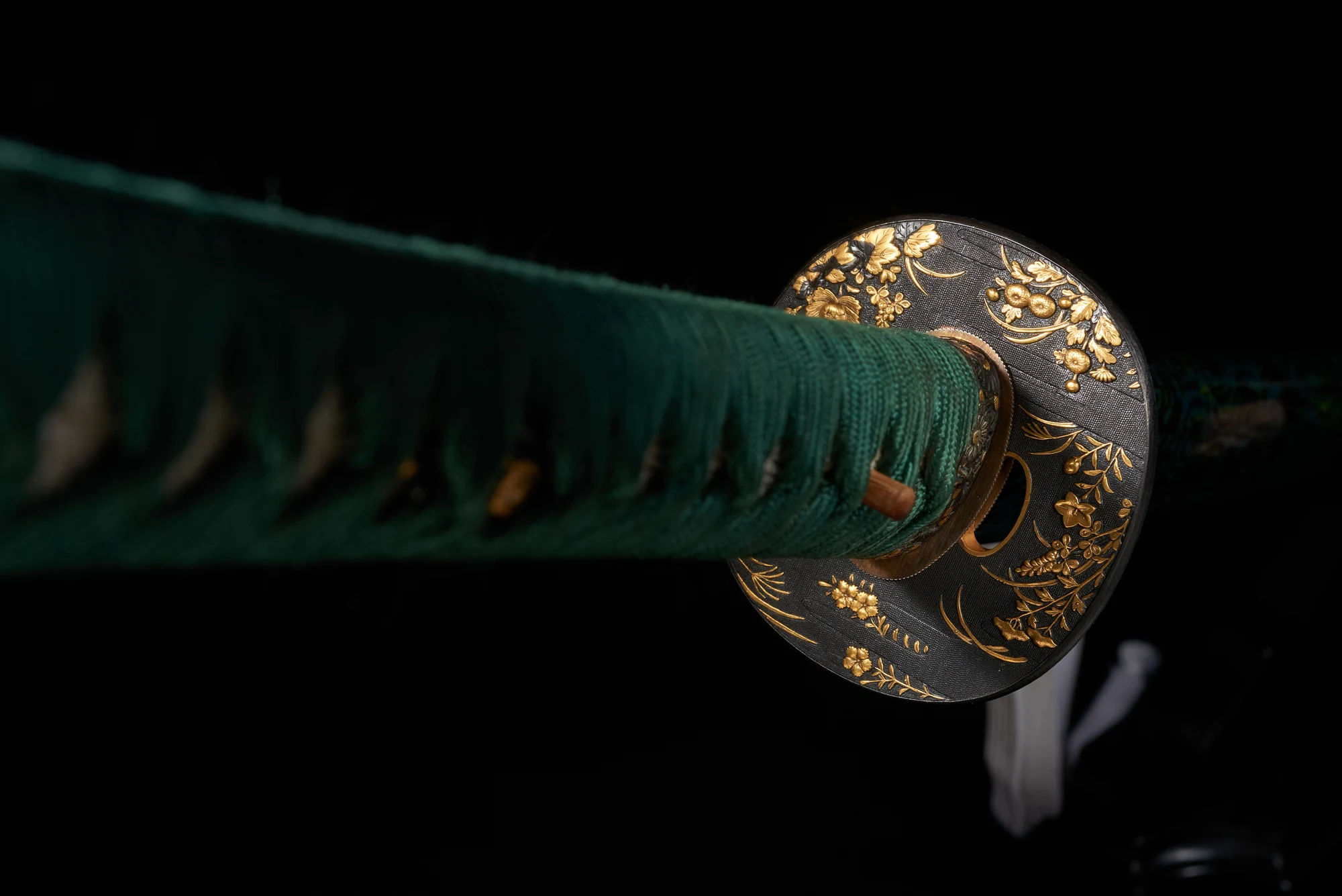 The handle and guard of a katana sword.