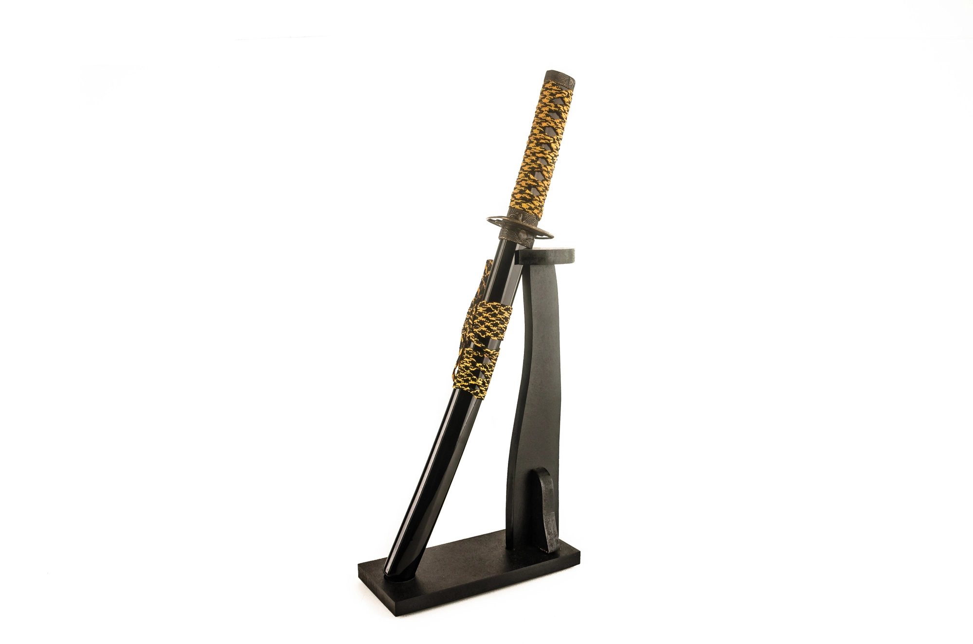 Wakizashi sword displayed in a vertical stander.