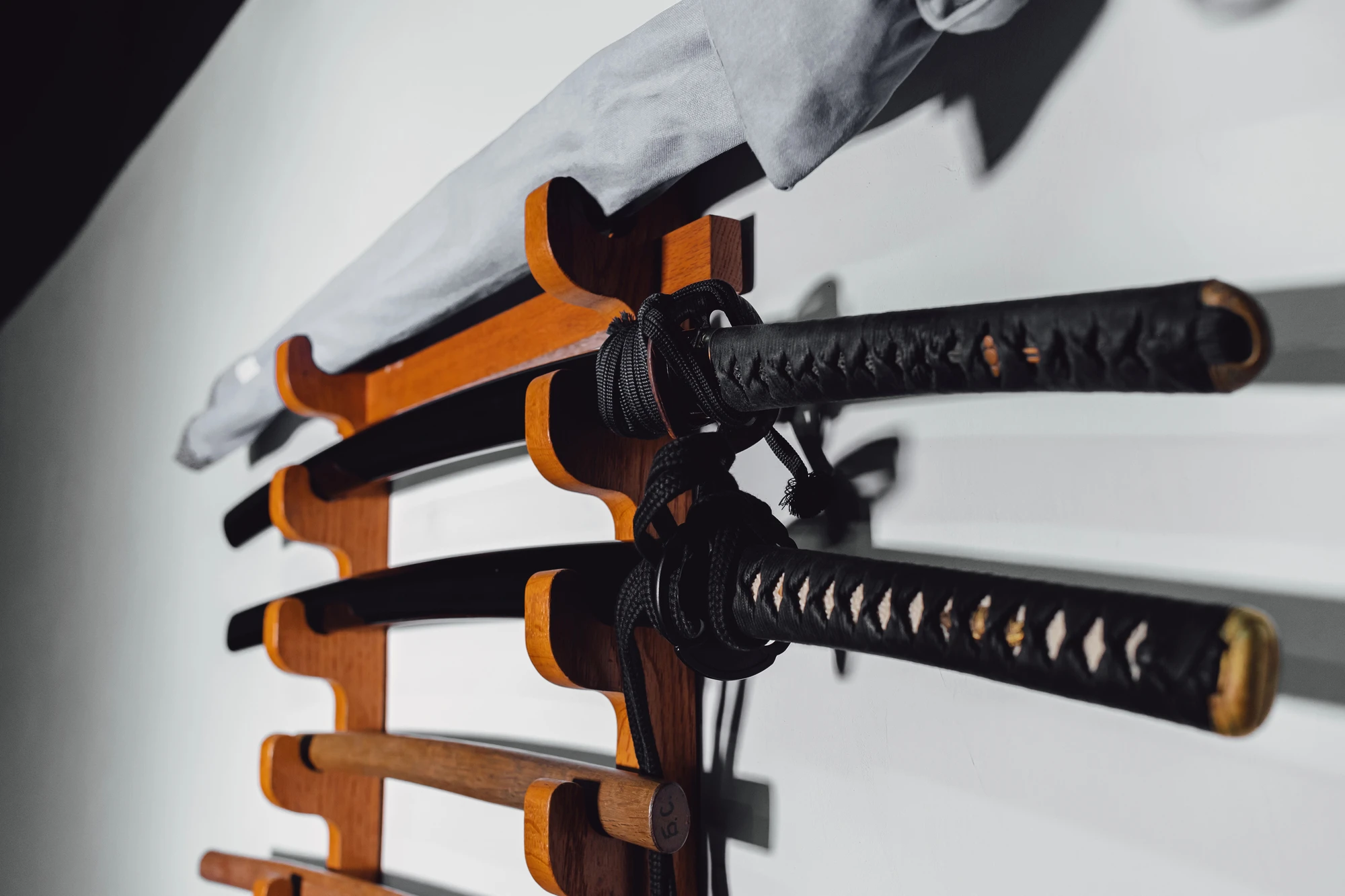 Katana swords mounted in a wall.