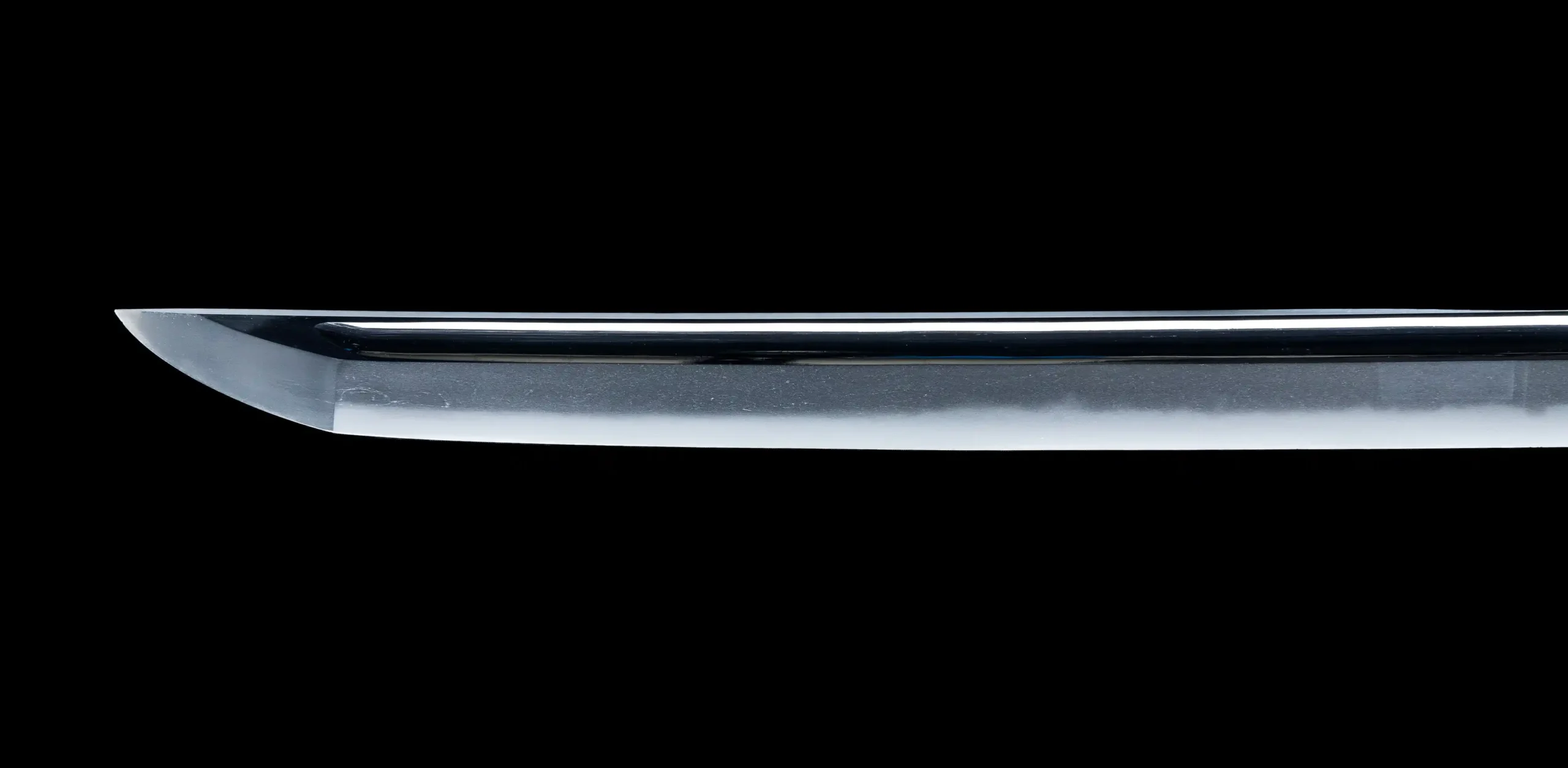 Authentic tamahagane steel katana showing a natural straight hamon